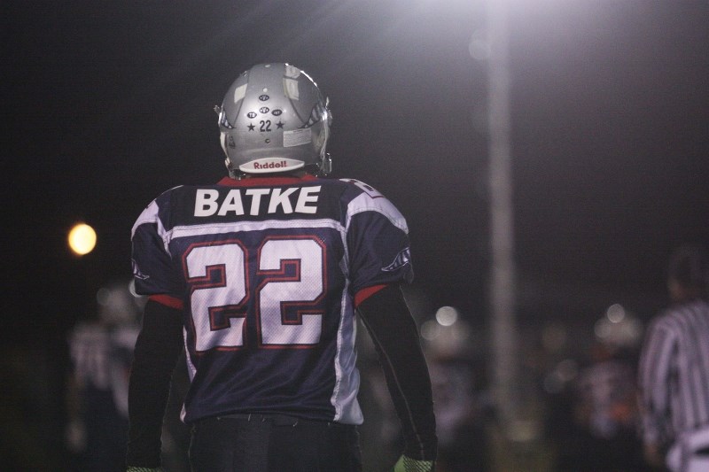 Bonnyville Voyageurs Patrick Batke stands on the field waiting under the lights during last year&#8217;s Scott MacDonald Memorial game