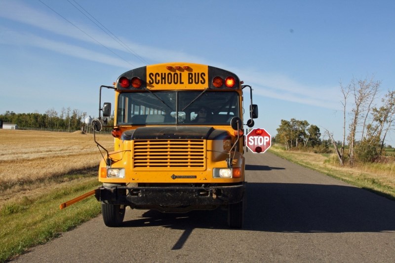 A local school bus stops just outside of Bonnyville on Sept. 19.