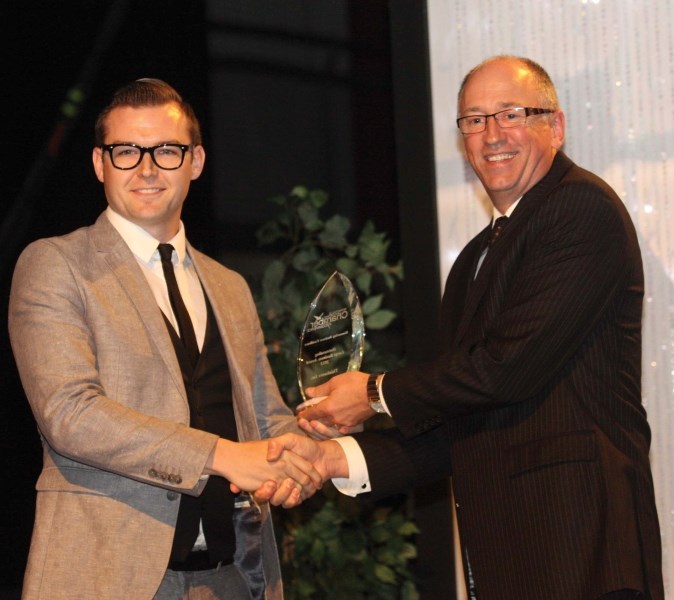 Kelsey Brennan of local business Thinkwerx accepts the award for Best Large Business following a successful 12 months at his company.