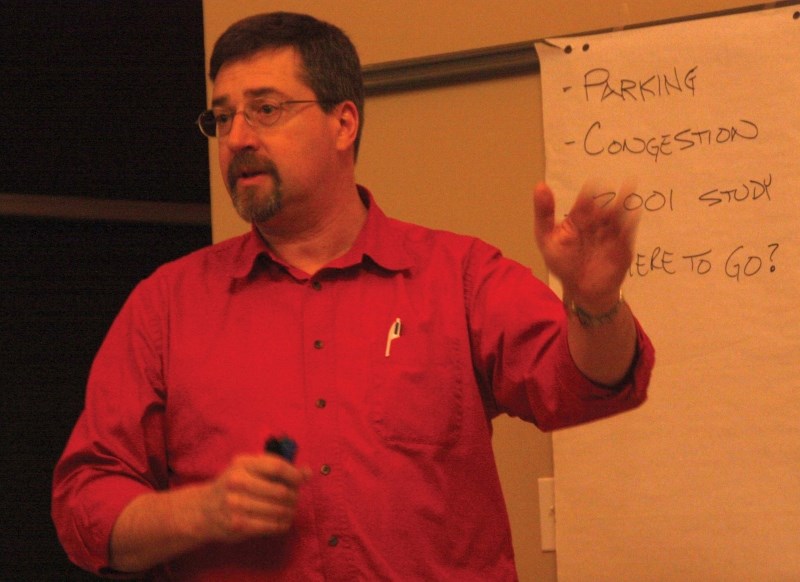 Bonnyville Mayor Gene Sobolewski speaks to a crowd of roughly 20 people at last week&#8217;s parking and traffic congestion meeting, held at the Shaw House in Bonnyville.