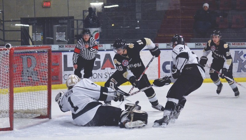 Pontiacs forward Michael Iovanna (10) jams away at a loose puck during first period action on Jan. 4 against Sherwood Park. Bonnyville would go on to win 8-6.