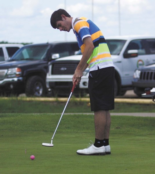 Clayton Borders attempts a putt at the 50/50 putting challenge at this weekend&#8217;s Kleinmann Cup.