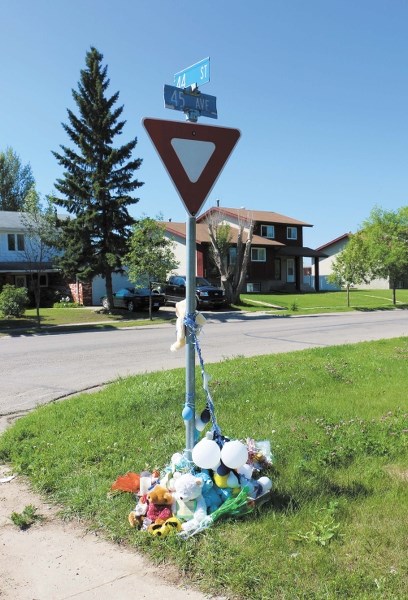 A memorial has been set up at the location of the collision in Bonnyville that killed two people last week.