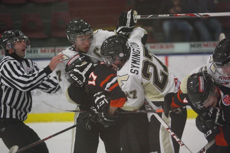 Pontiacs forward Steenn Pasichnuk lays a hit in the first period of Friday night&#8217;s action against Lloydminster. Bonnyville lost to the Bobcats 3-2 in a shootout.