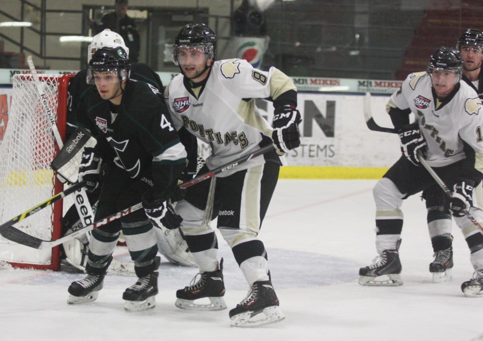 Bonnyville&#8217;s Luke Mahura battles for positioning in front of the Sherwood Park net during AJHL action on Sept. 30. Mahura tied the game up in the third to force