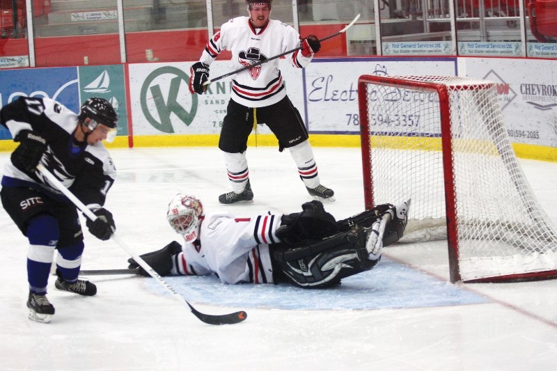 Cold Lake Ice forward Connor Fynn slides the puck past the Lloydminster Bandits goaltender to score the team&#8217;s second goal in a 4-3 double overtime victory on Saturday.