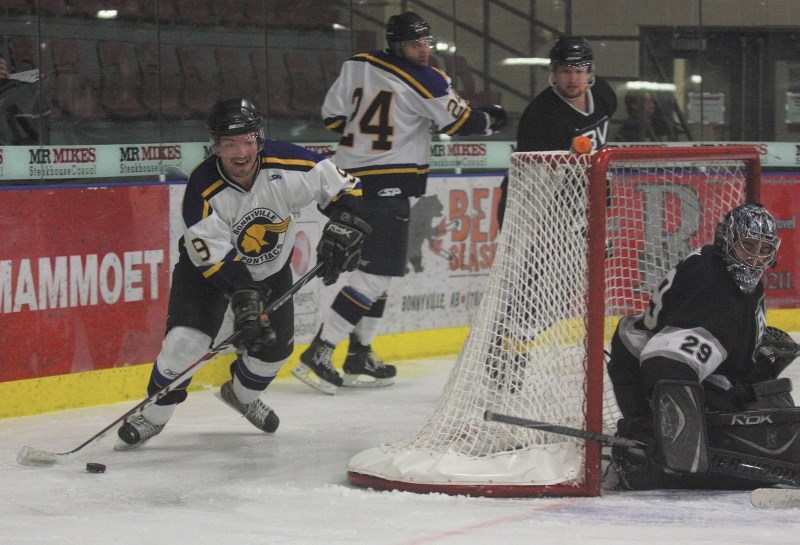 Bonnyville Sr. Pontiacs forward Denis Cadrin carries the puck out from behind the net during Senior AA hockey action against the Big Valley Oil Kings on Saturday night.