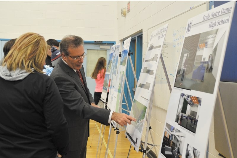 Joe Arruda, Lakeland Cathoilc School Board Superintendent talks about the NDHS remodernization plans will several residents at an open house.