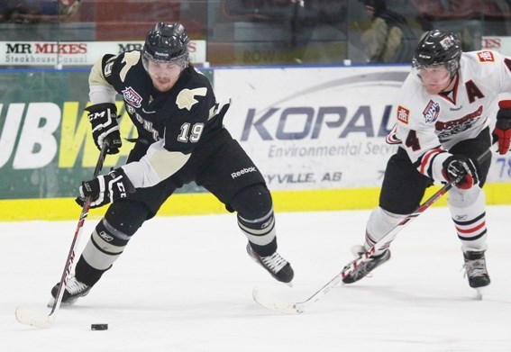 Bonnyville&#8217;s Brady Bakke carries the puck up the ice during AJHL action against Whitecourt on Jan. 31.