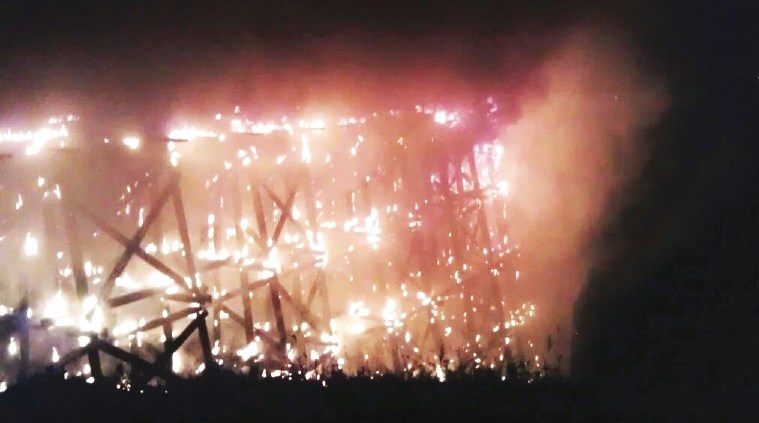 Work has begun to rebuild the Beaver River Trestle almost three years after the structure was set ablaze.