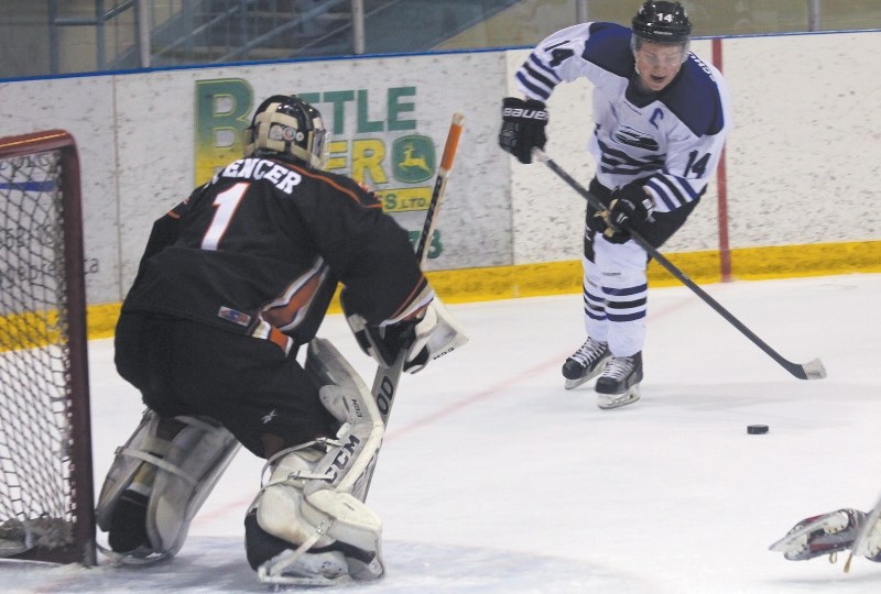 Cold Lake Ice captain Chad Schulteiss takes a shot on net during Game 1 of their final playoff series against the Wainwright Bisons on Friday, Mar. 13.