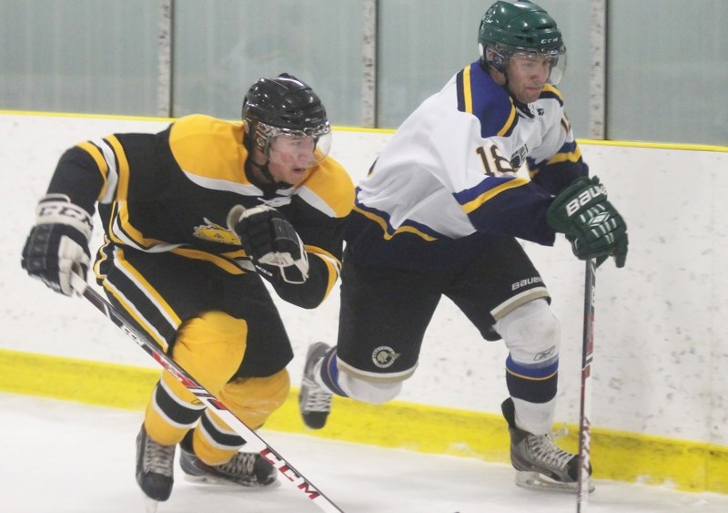Senior Pontiacs forward Craig Cuthbert chases down a lose puck in a game against the Nanton Palominos in Friday night.
