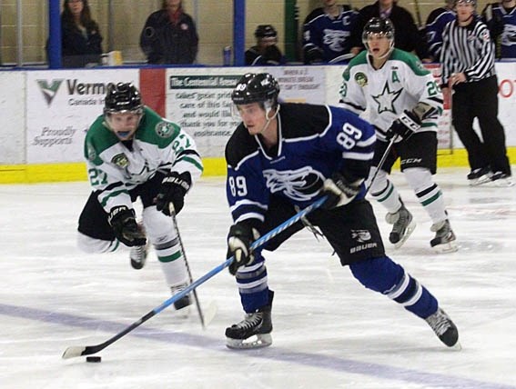 Cold Lake Ice forward Devin Hascarl carries the puck up ice during a game against the North Peace Navigators.