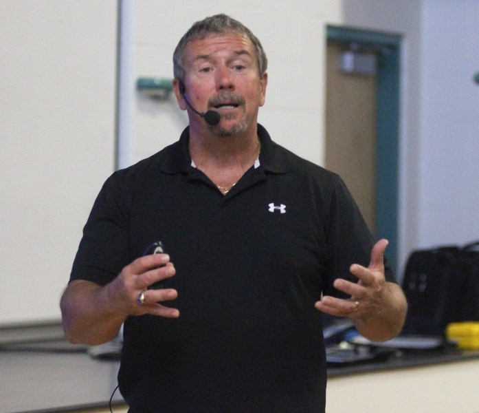 Retired school resource officer Dwayne Peace spoke to students at Assumption Jr./Sr. High about bullying.