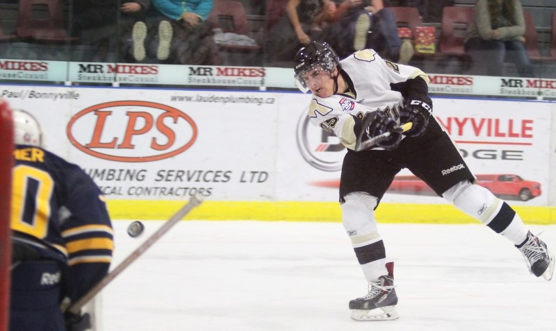 Bonnyville Pontiacs forward Brandon Whistle fires a shot on goaltender Tallon Kramer on Friday night against Grande Prairie.