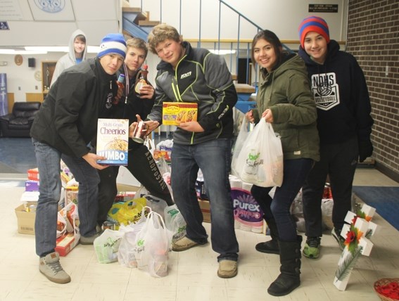 Students from NDHS spent a night outside to collect food and monetary items for the food bank.