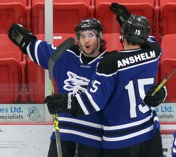 Ice veteran Christian Nypower (12) celebrates with Taylor Anshelm (15) after scoring a goal, en route to a double hat trick in their victory over the Vegreville Rangers on