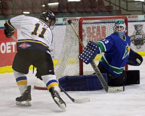 Lucas Isley fires a shot on goal during Game 3 of the North Division Final on Saturday night in Bonnyville. The Sr. Pontiacs won 11-2 to cap off a series sweep.