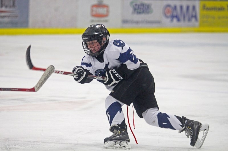 Carson Croteau fires a shot on goal during spring hockey action on Saturday afternoon at the Centennial Centre.