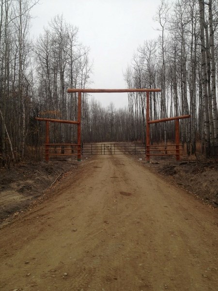 The enterance to the new FASD summer camp being built out in the woods northeast of Cold Lake near French Bay.