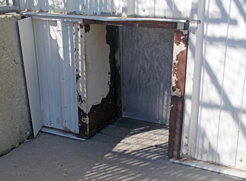 One of the rusted doggy doors in the Bonnyville SPCA&#8217;s isolation kennels. The shelter is hoping to raise $20,000 for repairs.