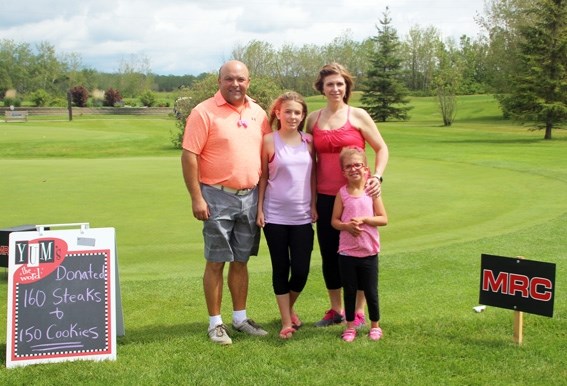 (left to right) Mark, Keanna, Andrea, and Kennedy Reid host the Children&#8217;s Charity Golf Classic each year to raise money for the Stollery. This year brought in $21,000.
