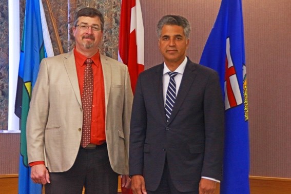 Bonnyville Mayor Gene Sobolewski (left) and Minister of Human Services Irfan Sabir during Sabir&#8217;s visit to Bonnyville last week.