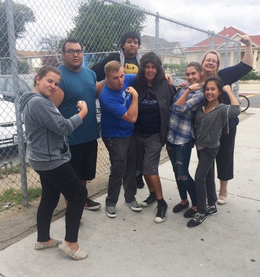 Dancer from Fame with staff from the Dream Center in Los Angeles.