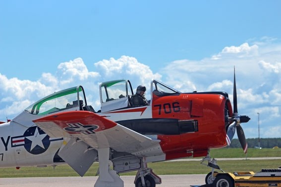 Experienced pilot Bruce Evans died tragically on Sunday when his plane crashed during his performance in the Cold Lake Air Show. Evans is pictured here in his T-28 Trojan
