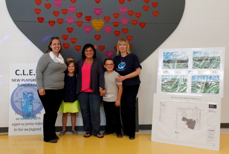 Three generations of CLES students attended the open house on Tuesday. (left to right) Northern Lights Public Schools board chair Mandi Skogen, her daughter Hailey, CLES