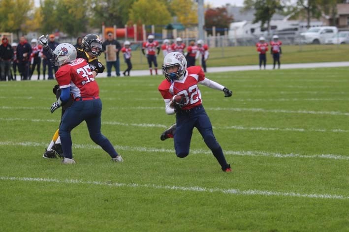 Renegades Titus Fagnan (32) jukes out a defender in Sunday&#8217;s season opener.