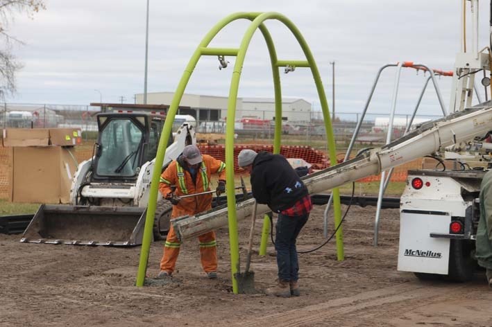 Construcition has been on-going all week to build the playground.