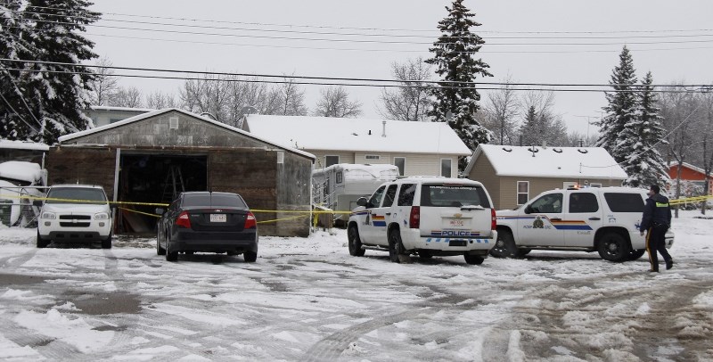 Police surrounded a Bonnyville home on Sunday after finding an elderly man dead inside. Autopsy has ruled the death a homicide.