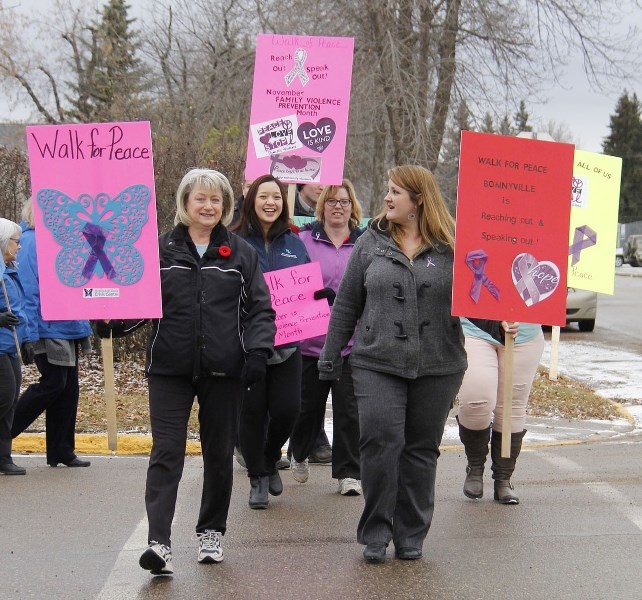 Coun. Lorna Storoschuk (front left) and Candina Wosminity of the Dr. Margaret Savage Crisis Centre Bonnyville Outreach (front right) lead the way in Bonnyville&#8217;s first