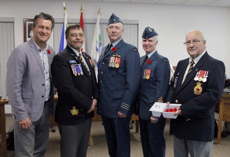 On Oct. 25, the Cold Lake Royal Canadian Legion Branch 211 kicked off their annual Poppy Campaign by distributing poppies to municipal and 4 Wing officials. (left to right)