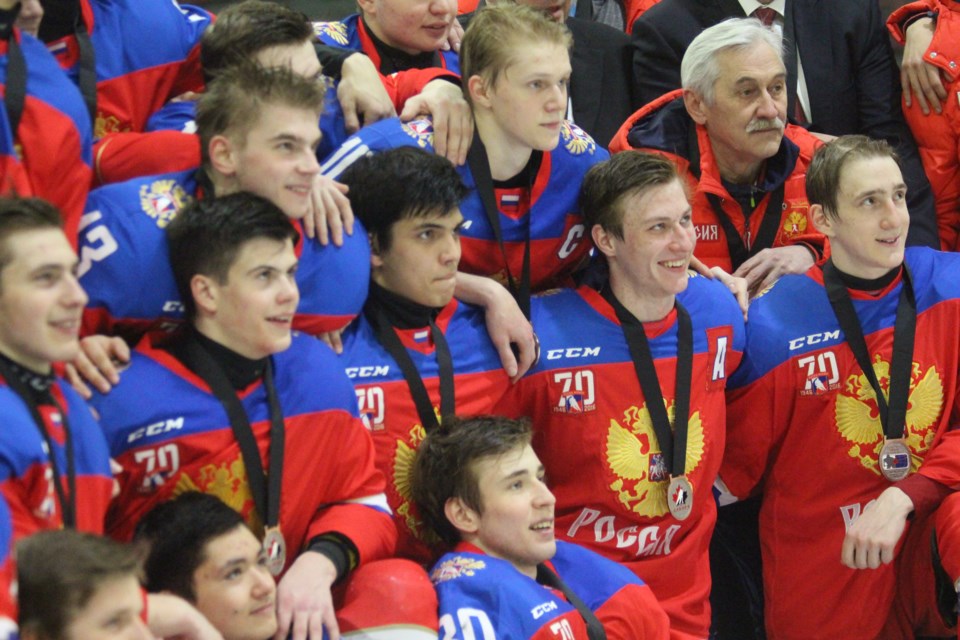 Russia celebrates their 7-4 win over the Czech Republic during the bronze medal game of the Junior A Challenge on Friday, Dec. 16.
