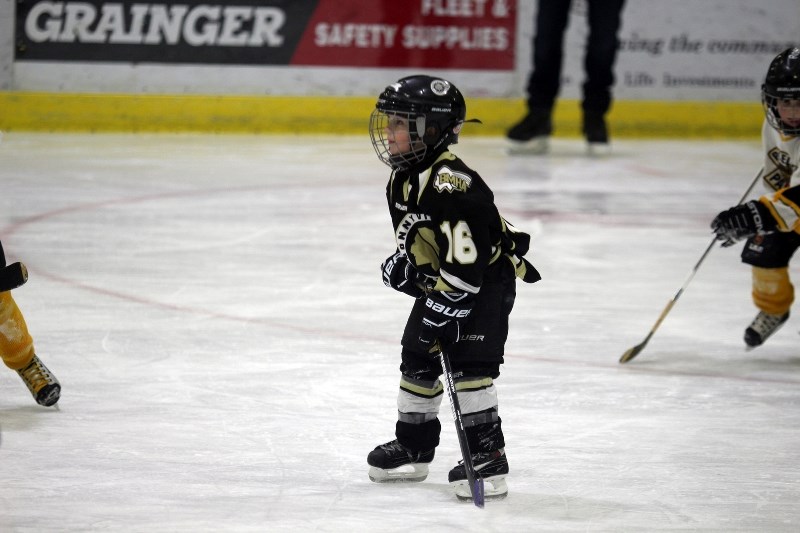 Kieran Willick waits for a pass from his teammates. Willick plays for the BMHA Initiation Team 4.