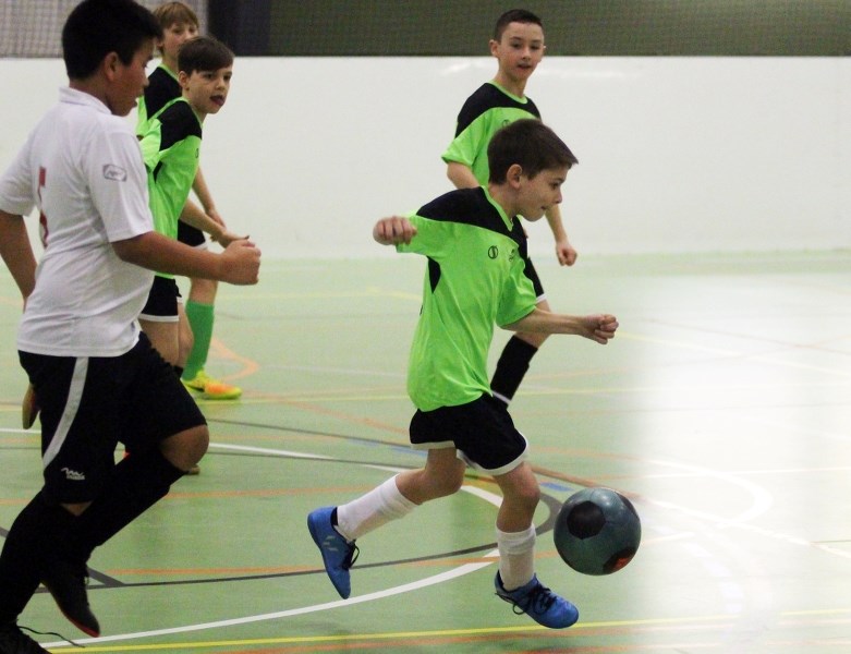 Nolan Benko of the Bonnyville U12 boys team takes control of the ball during a Lakeland Cup match versus Cold Lake.