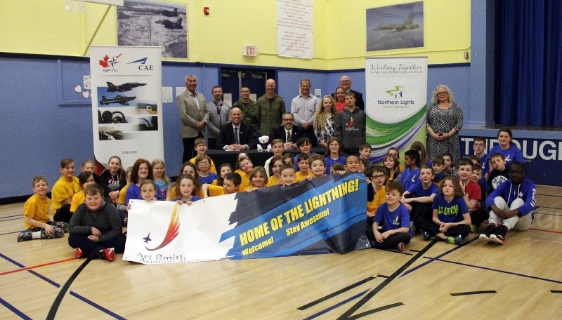 Students at ASAA, and representatives from all parties involved in the creation of the MOU, celebrating the signing of the agreement on Monday, March 6.