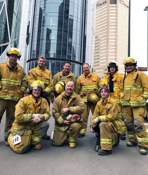 Members of the Bonnyville fire department prepare to climb the Bow Tower. (back row) Dan Cazabon, Triston Ilko, Colin Atkinson, Stephen Stone, Colton Batke, and Rob Hole.