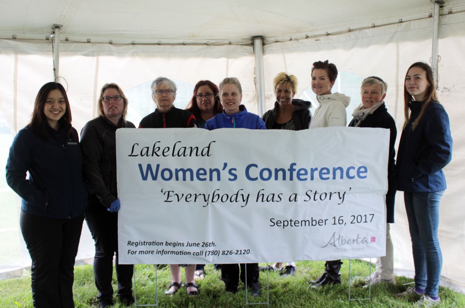 Sherwood Park MLA Annie McKitrick presents the cheque to the Lakeland Women&#8217;s Conference on Wednesday, June 21.