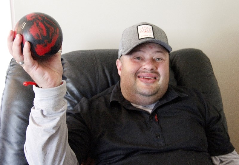 Leo Gange is ready to bowl a strike with the Lakeland Special Olympics.