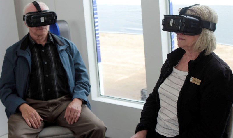Town of Bonnyville Coun. Ray Prevost and Coun. Lorna Storoschuk try out the virtual reality headsets, one of the few futuristic products on display at the Telus Future Home.