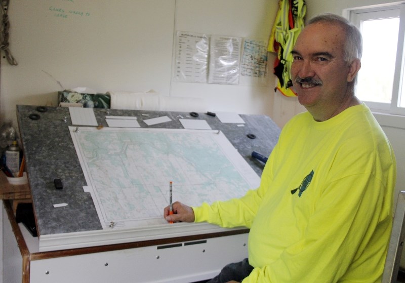 Stephen Medford, president of Bonnyville SAR, explains the role of the command centre during a search and rescue mission.