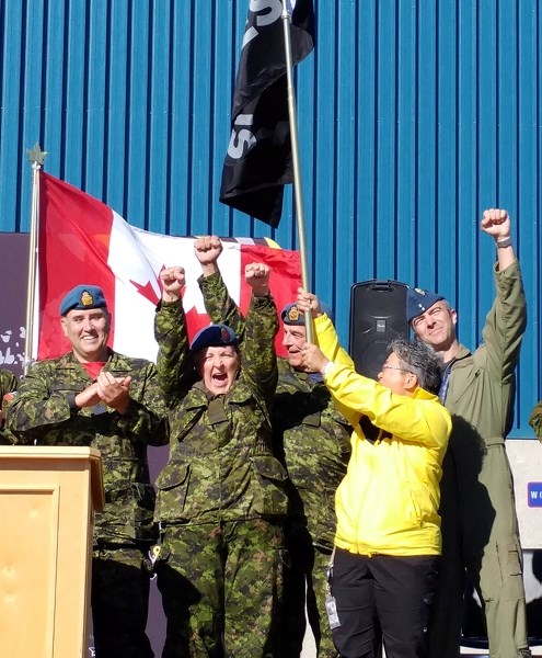 Pte. Martine Duval (second from left) of 4 Wing Cold Lake lets out a cheer during the Invictus Games National Flag Tour at the J.J. Parr Centre on Friday.