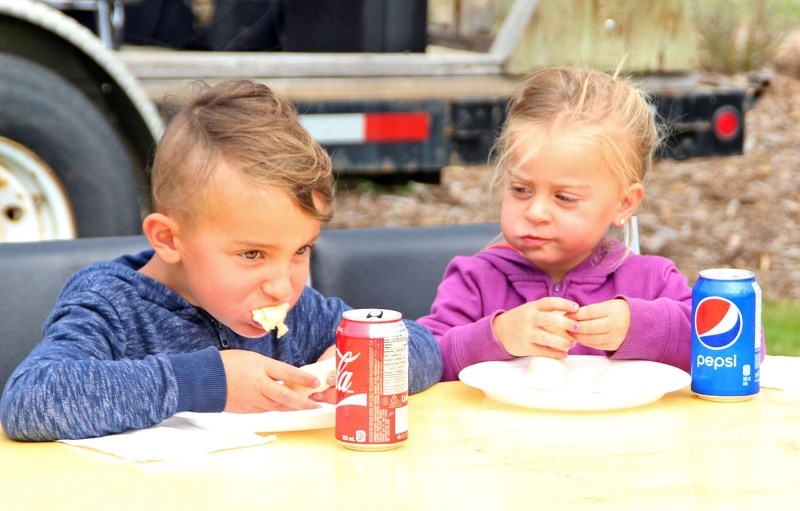 Archer and Marcy Machado dig into their plate of pyrogies during the annual pyrogy eating competition at Glendon&#8217;s Pyrogy Fest.