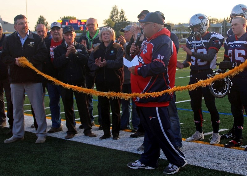 On Saturday, Sept. 16, the community celebrated the grand opening of Walsh Field. Dan Jubinville addressed the crowd prior to the ribbon cutting.