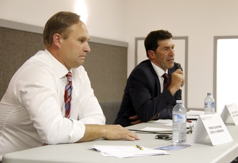 Barry Kalinski (left) and Gary Sawchuk (right) discussed their platforms and answered questions during the reeve candidate forum at the Ardmore Community Hall on Thursday,