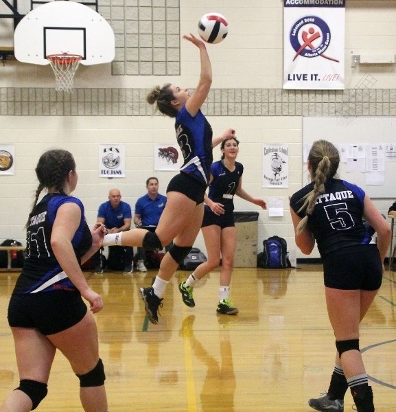 Beaux-Lacs&#8217; Shae Hoolahan stops the Boyle serve with a well-executed first pass.