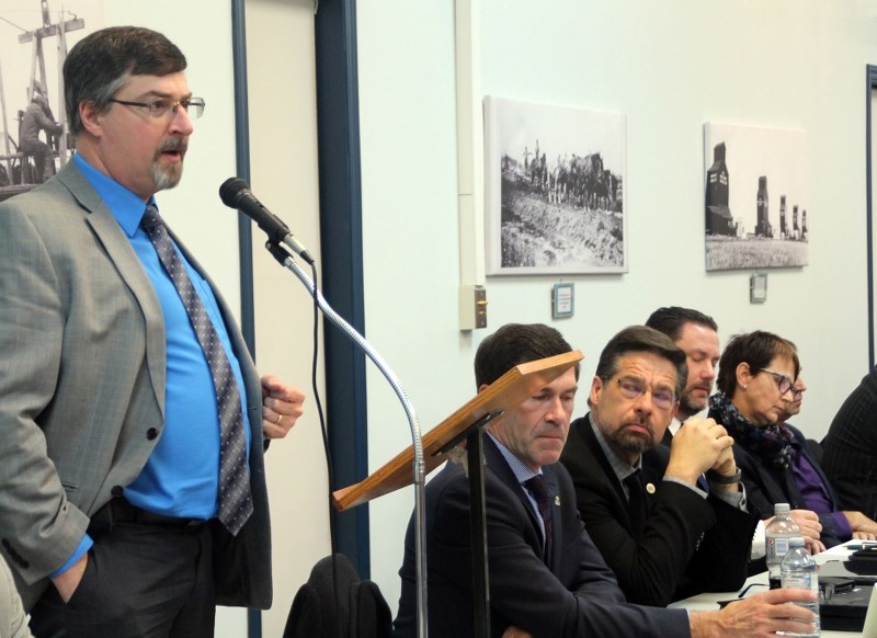 Bonnyville mayor Gene Sobolewski addresses a frustrated crowd during the MD of Bonnyville rural crime forum.